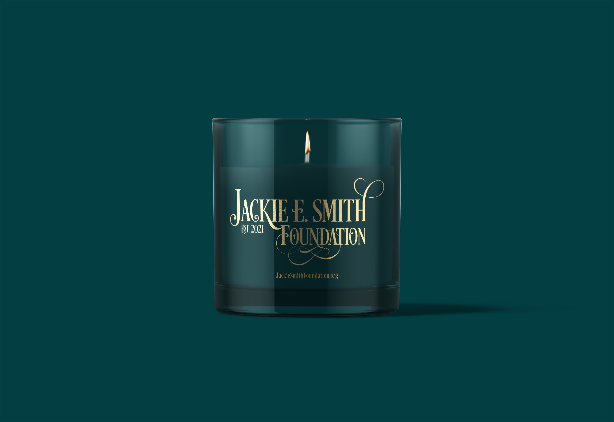 Jackie E. Smith Foundation Logo Design on Candle